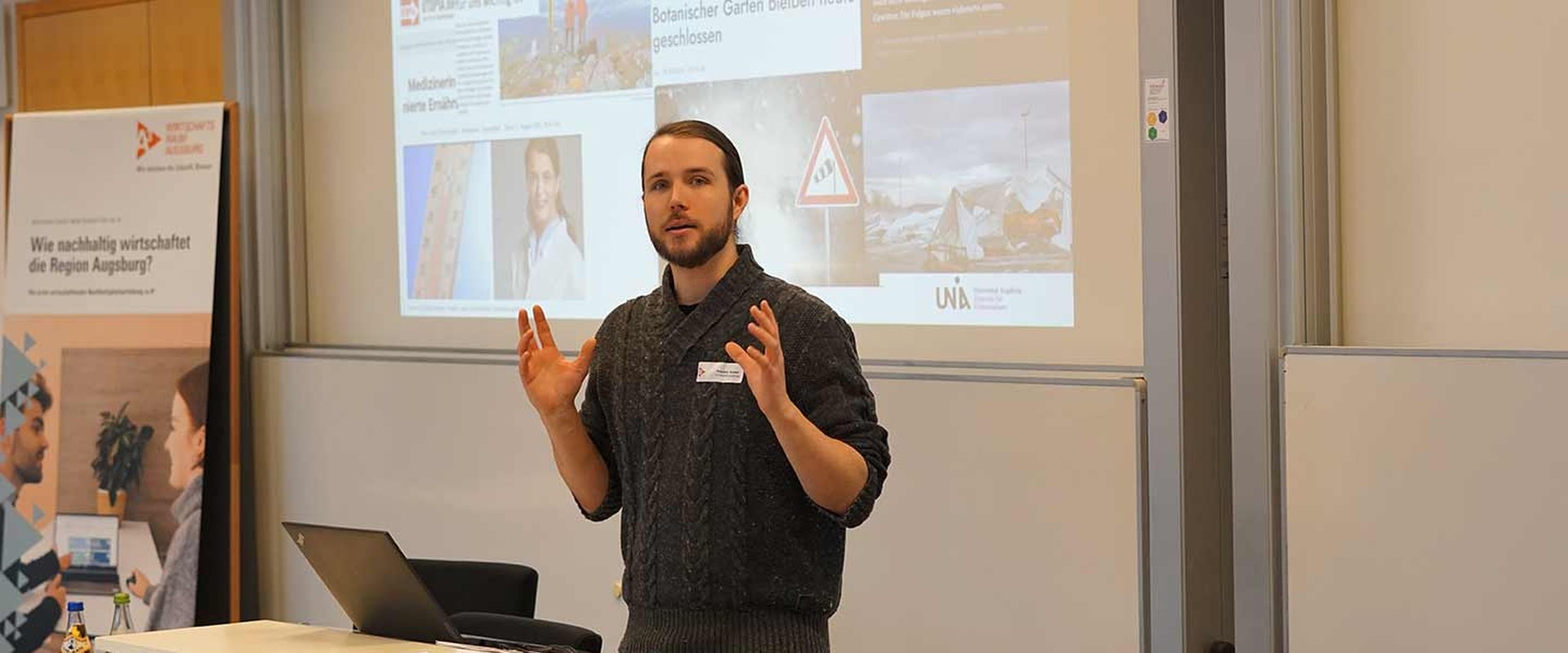 Rouven Kaiser als wissenschaftlicher Spielleiter eines Serious Gaming-Planspiel für Unternehmen