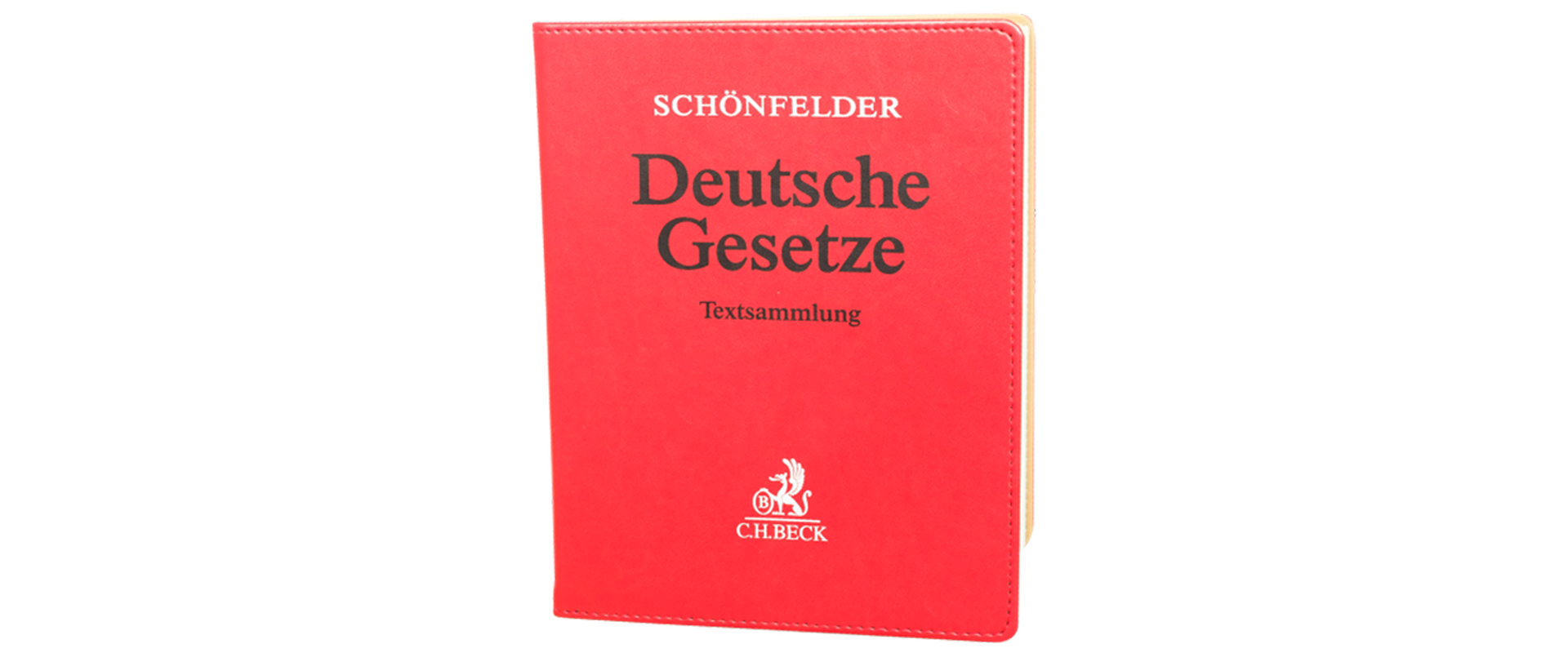Das Gesetzbuch "Deutsche Gesetze" hat einen roten Einband und ist eine Textsammlung von wichtigen Gesetzen und steht für die Juristische Fakultät.
