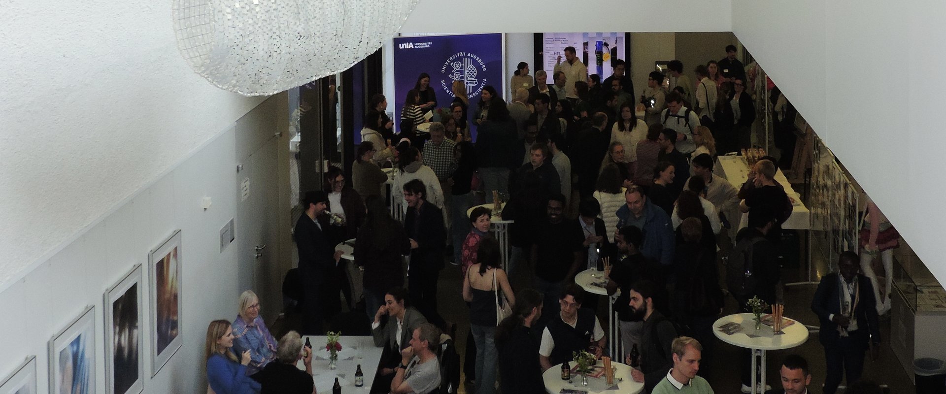 View from above on crowd in the hall of building for music and arts