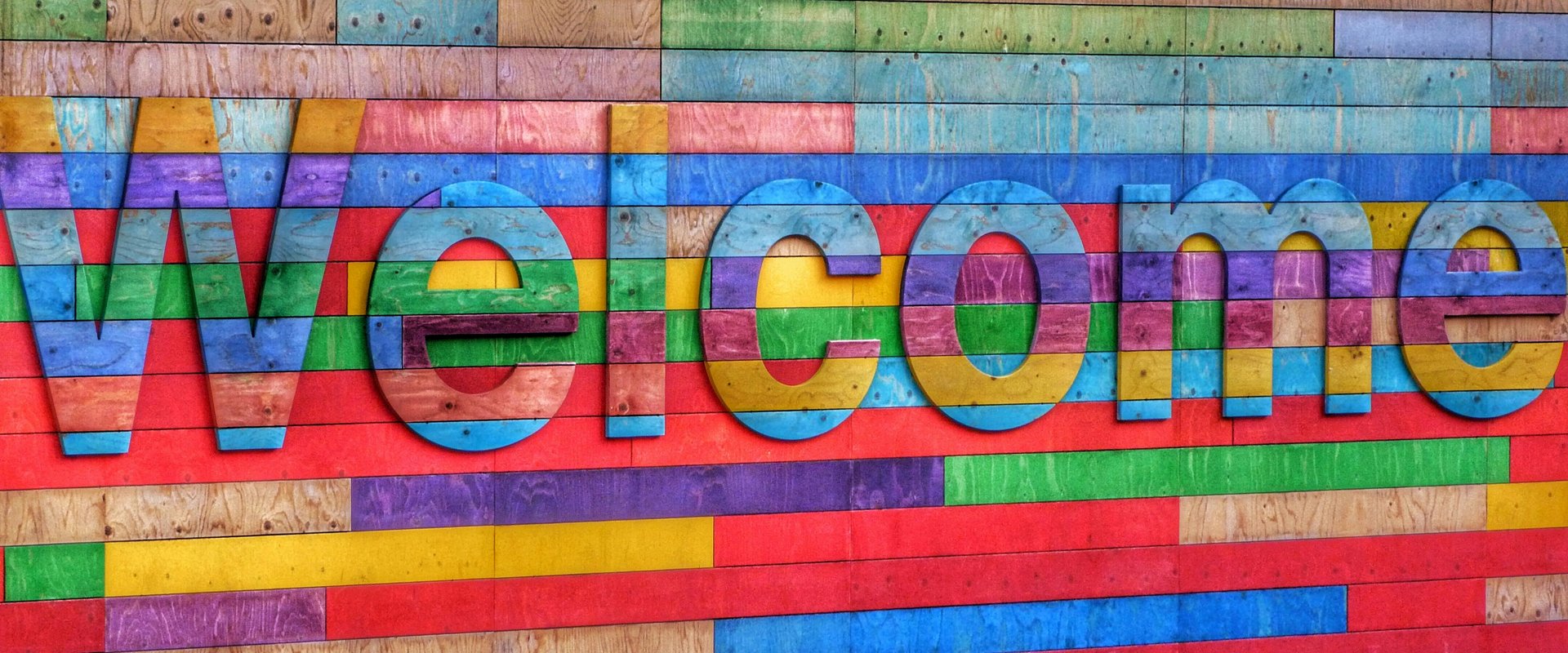 A colourful Welcome sign