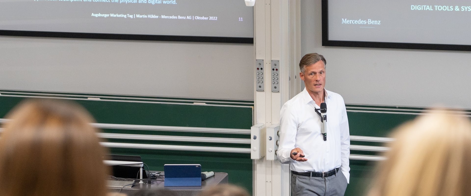 Martin Hülder speaking at 4. AUXMT
