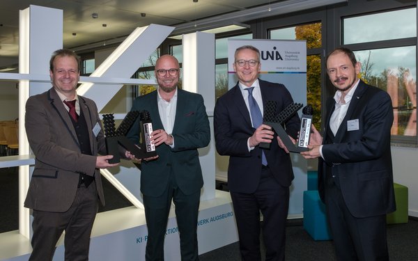 Prof. Dr. Kay André Weidenmann (Vizepräsident für Forschung, Digitales und Technologieallianzen der Universität Augsburg), Dr. Fabian Mehring (Bayerischer Staatsminister für Digitales), Dr. Karsten Wildberger (Bundesminister für Digitales)