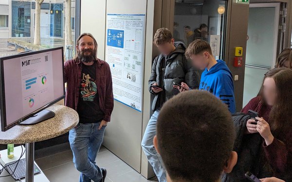 Dr. Florian Auer auf dem Tag der Informatik an der Universität Augsburg