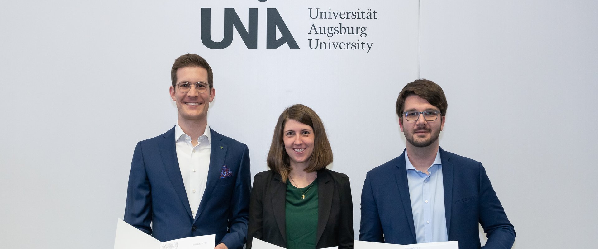 Drei Preisträgerinnen und Preisträger bei der Zentralen Promotionsfeier