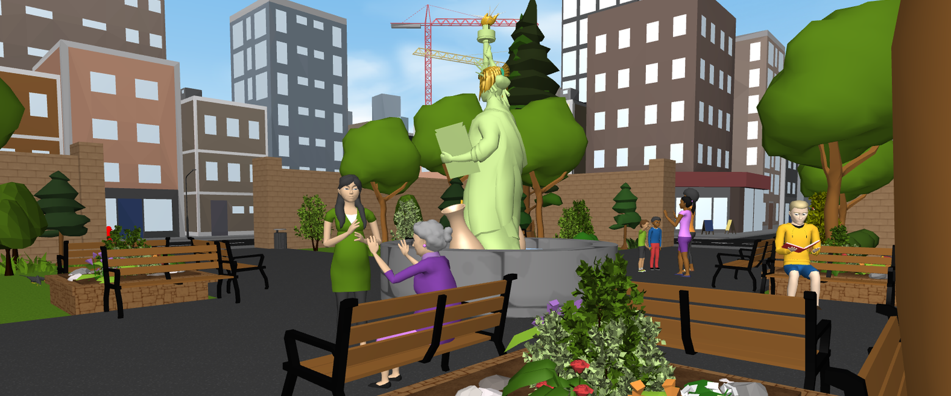 Das Bild zeigt eine Platz mit Pflanzkübeln in denen Blumen wachsen und Bänken, auf denen teilweise Menschen sitzen. In der Mitte steht ein Becken mit einer Art Freiheitsstatue. Im Hintergrund sind Hochhäuser.